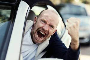 angry man shaking fist