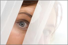 peeking thru curtains