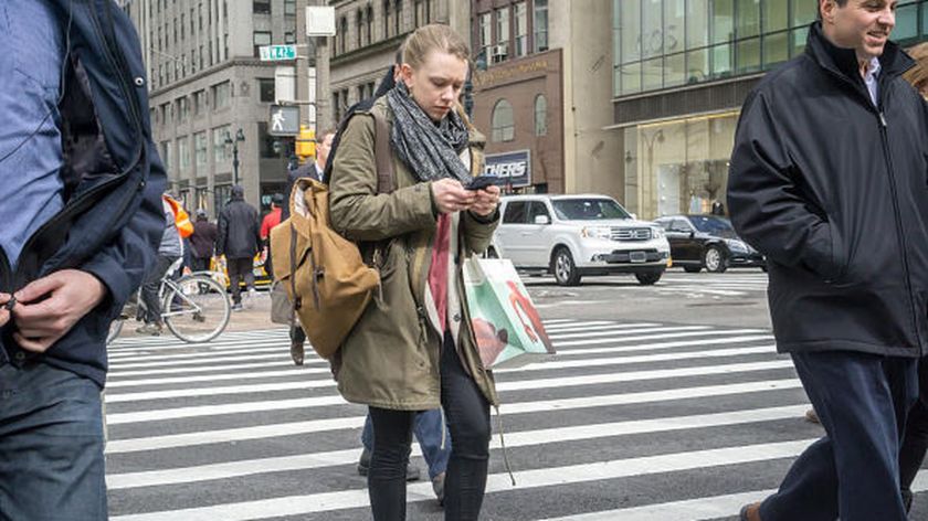 crossing street with phone.jpg