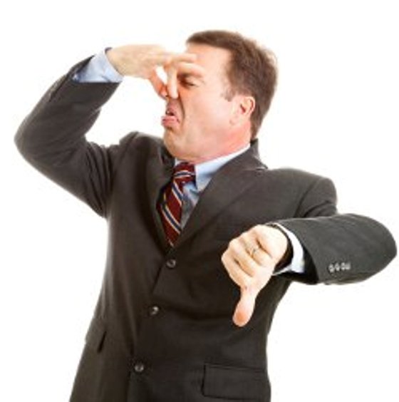 holding nose thumbs down larger.jpg