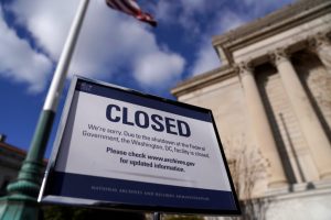 A sign declares the National Archive is closed due to a partial federal government shutdown in Washington