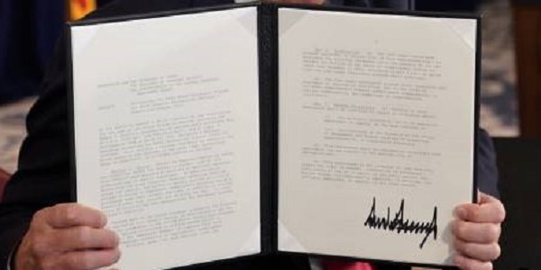 Exec order holding cropped